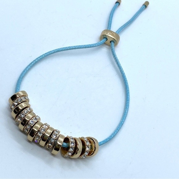 KENNETH COLE Slider Bracelet Goldtone and Blue Cording - Picture 1 of 5